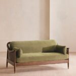 talent design, bruna kanepe, retro dönem kanepe, yeşil kadife döşemeli koltuk, ceviz ağacı gövde, hasır kollu koltuk, masif ceviz iskeletli kanepe, vintage oturma grubu, bohem salon kanepe, rustik modern koltuk, ahşap ayaklı kadife kanepe, iç mekan dekorasyon önerisi, klasik-modern uyum, oturma odası şıklığı, doğal malzeme koltuk tasarımı