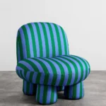 talent design, modern çizgili berjer koltuk, renkli desenli tekli koltuk, minimal tasarım salon koltuğu, yuvarlak hatlı iç mekan koltuğu, çağdaş çizgili döşemeli koltuk, konforlu ve tarz tekli oturum, dekoratif modern koltuk önerisi, genç ve dinamik koltuk stili, şık formda desenli koltuk modeli, renkli iç mekan uyumlu koltuk, kol destekli modern berjer alternatifi, çizgili kumaş döşeme trendi, eğlenceli ve modern çizgi estetiği koltuk