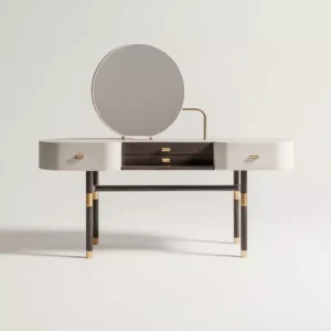 ÜRÜN TANITIMI Lumea Makyaj Masası, yumuşak kıvrımlı gövdesi, dairesel aynası ve ince metal detaylarıyla yatak odasında zarif bir mimari odak noktası oluşturur. Dengeli oranlara sahip ayak yapısı ve sade yüzey dili, parçayı hem fonksiyonel hem de heykelsi bir tasarım objesine dönüştürür. RH’nin rafine lüks anlayışı, Soho Home’un modern şehir estetiği ve Anthropologie’nin feminen, dokunsal yaklaşımı Lumea’da sakin ve zamansız bir bütünlük kazanır. ÖNE ÇIKAN DETAYLAR Dairesel formda, ayarlanabilir ayna Yumuşatılmış köşelere sahip zarif gövde İnce pirinç detaylı kulp ve bağlantılar Hafif ve dengeli ayak kurgusu Modern, sade ve feminen tasarım dili İÇ DÜZEN & FONKSİYON Yan bölümlerde çekmeceli depolama alanı Orta bölümde açık raflı kullanım alanı Kişisel bakım ve makyaj ürünleri için ideal düzen Yatak odası veya giyinme alanlarında konforlu kullanım ÖLÇÜLER Genişlik: 120 cm Derinlik: 45 cm Yükseklik: 75 cm Ayna Çapı: 50 cm (Ölçüler görseldeki oranlara göre belirlenmiştir. Talep doğrultusunda ölçüler mekâna özel olarak yeniden üretilebilir.)